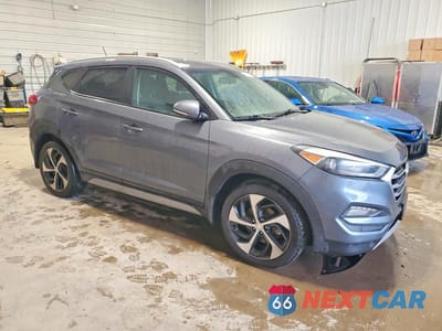Czwarte zdjęcie samochodu z boku: 2017 HYUNDAI TUCSON SPORT VIN:KM8J33A29HU284435 - miniatura