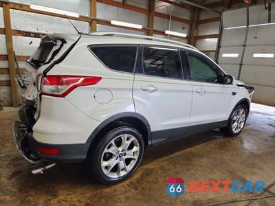 Trzecie zdjęcie samochodu z tyłu: 2014 FORD ESCAPE TITANIUM VIN:1FMCU0J95EUB07197 - miniatura