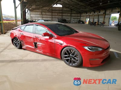 Czwarte zdjęcie samochodu z boku: 2022 TESLA MODEL S VIN:5YJSA1E5XNF464616 - miniatura