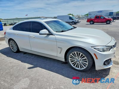 Czwarte zdjęcie samochodu z boku: 2015 BMW 428 I GRAN COUPE VIN:WBA4A5C59FD410359 - miniatura