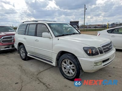 Czwarte zdjęcie samochodu z boku: 2003 LEXUS LX 470 BASE VIN:JTJHT00WX33530491 - miniatura