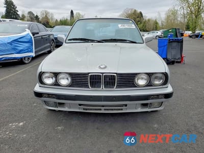 Piąte zdjęcie samochodu w środku: 1990 BMW 325 IX VIN:WBAAE9316LED64297 - miniatura