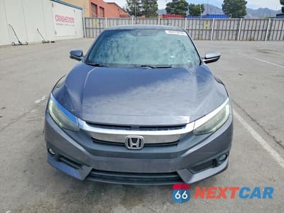 Piąte zdjęcie samochodu w środku: 2016 HONDA CIVIC TOURING VIN:2HGFC3B99GH357280 - miniatura