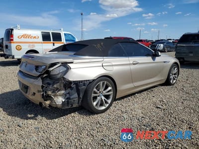 Trzecie zdjęcie samochodu z tyłu: 2012 BMW 640 I VIN:WBALW7C52CC618478 - miniatura