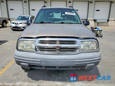 Piąte zdjęcie samochodu w środku: 2003 CHEV TRACKER VIN:2CNBJ13CX36920520 - miniatura