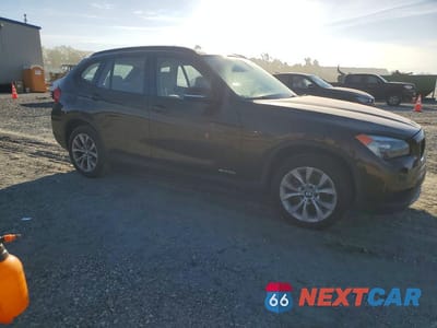 Czwarte zdjęcie samochodu z boku: 2014 BMW X1 XDRIVE28I VIN:WBAVL1C50EVR92609 - miniatura