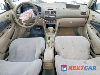 Zdjęcie 8 z 14 samochodu: 1999 TOYOTA COROLLA VE VIN:1NXBR12E9XZ295109 - miniatura
