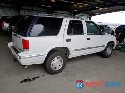 Trzecie zdjęcie samochodu z tyłu: 1995 GMC JIMMY VIN:1GKCS13W4S2559513 - miniatura