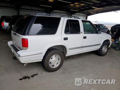 Trzecie zdjęcie samochodu z tyłu: 1995 GMC JIMMY VIN:1GKCS13W4S2559513 - miniatura