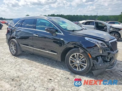 Czwarte zdjęcie samochodu z boku: 2021 CADILLAC XT5 PREMIUM LUXURY VIN:1GYKNDRS3MZ125320 - miniatura