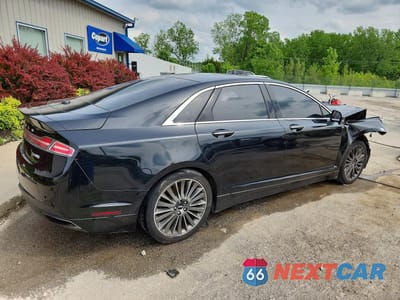 Trzecie zdjęcie samochodu z tyłu: 2015 LINCOLN MKZ VIN:3LN6L2J9XFR607215 - miniatura