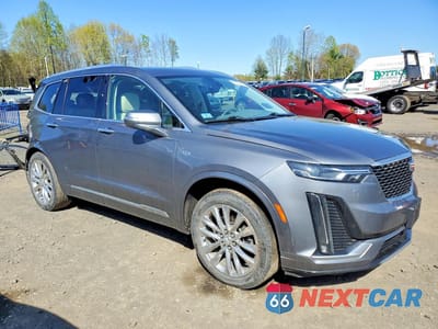 Czwarte zdjęcie samochodu z boku: 2022 CADILLAC XT6 PREMIUM LUXURY VIN:1GYKPCRS8NZ145469 - miniatura