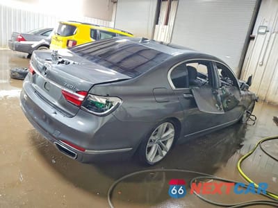 Trzecie zdjęcie samochodu z tyłu: 2018 BMW 750 XI VIN:WBA7F2C53JG423970 - miniatura