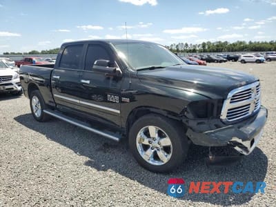 Czwarte zdjęcie samochodu z boku: 2016 RAM 1500 SLT VIN:1C6RR6TT2GS274845 - miniatura