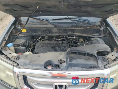 Zdjęcie 12 z 13 samochodu: 2011 HONDA PILOT EXL VIN:5FNYF4H54BB033998 - miniatura