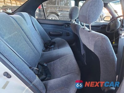 Zdjęcie 10 z 12 samochodu: 1995 TOYOTA COROLLA DX VIN:1NXAE09B0SZ312417 - miniatura