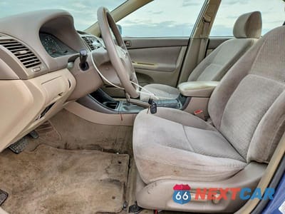 Zdjęcie 7 z 11 samochodu: 2003 TOYOTA CAMRY LE VIN:4T1BE32K23U731175 - miniatura