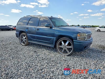 Czwarte zdjęcie samochodu z boku: 2005 GMC YUKON DENALI VIN:1GKEK63U05J243234 - miniatura
