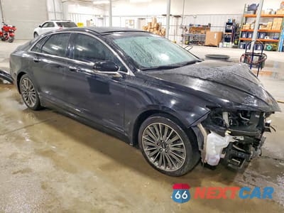 Czwarte zdjęcie samochodu z boku: 2016 LINCOLN MKZ VIN:3LN6L2JK1GR600982 - miniatura