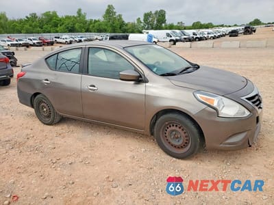 Czwarte zdjęcie samochodu z boku: 2015 NISSAN VERSA 1.6 SV VIN:3N1CN7AP7FL827317 - miniatura