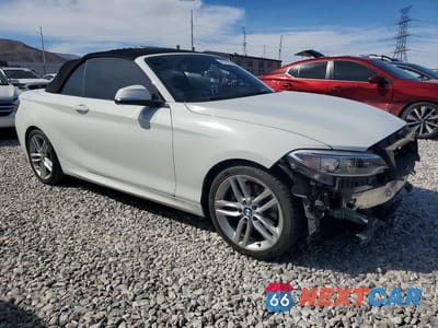 Czwarte zdjęcie samochodu z boku: 2017 BMW 230I VIN:WBA2K9C34H7A26357 - miniatura