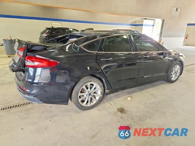 Trzecie zdjęcie samochodu z tyłu: 2019 FORD FUSION TITANIUM VIN:3FA6P0SU5KR212374 - miniatura