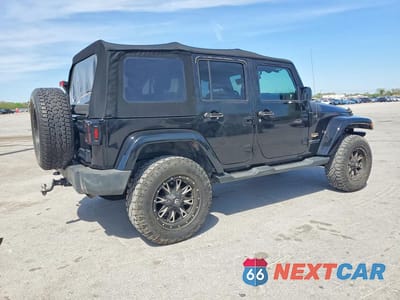 Trzecie zdjęcie samochodu z tyłu: 2014 JEEP WRANGLER UNLIMITED SAHARA VIN:1C4HJWEG0EL271977 - miniatura