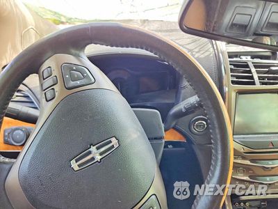 Zdjęcie 9 z 14 samochodu: 2011 LINCOLN MKX VIN:2LMDJ6JKXBBJ06006 - miniatura