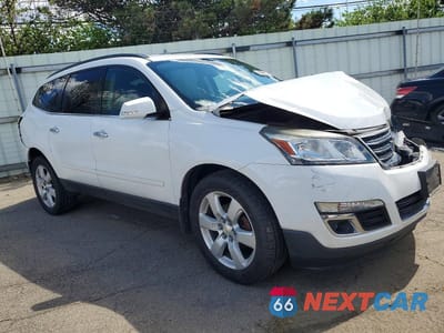 Czwarte zdjęcie samochodu z boku: 2016 CHEVROLET TRAVERSE LT VIN:1GNKRGKD3GJ311022 - miniatura