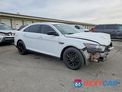 Czwarte zdjęcie samochodu z boku: 2015 FORD TAURUS VIN:1FAHP2D80FG200182 - miniatura