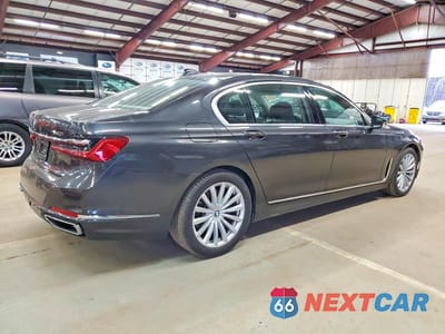 Trzecie zdjęcie samochodu z tyłu: 2022 BMW 740 I VIN:WBA7T2C09NCH24241 - miniatura