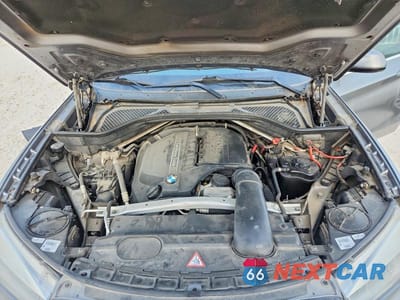 Zdjęcie 12 z 14 samochodu: 2014 BMW X5 SDRIVE35I VIN:5UXKR2C51E0H32650 - miniatura