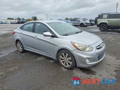 Czwarte zdjęcie samochodu z boku: 2012 HYUNDAI ACCENT GLS VIN:KMHCU4AE9CU115045 - miniatura
