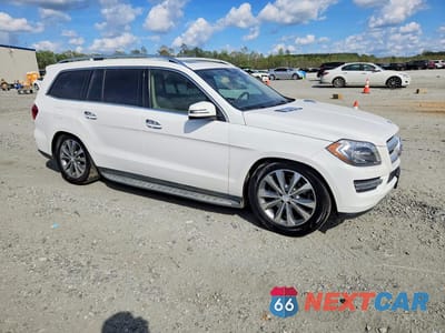 Czwarte zdjęcie samochodu z boku: 2015 MERCEDES-BENZ GL 450 4MATIC VIN:4JGDF6EE2FA493640 - miniatura