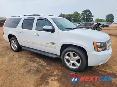 Czwarte zdjęcie samochodu z boku: 2011 CHEVROLET SUBURBAN C1500 LT VIN:1GNSCJE02BR283540 - miniatura