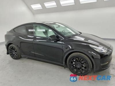 Czwarte zdjęcie samochodu z boku: 2021 TESLA MODEL Y VIN:5YJYGAEE6MF201613 - miniatura