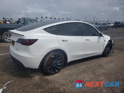 Trzecie zdjęcie samochodu z tyłu: 2022 TESLA MODEL Y VIN:7SAYGDEF6NF459712 - miniatura