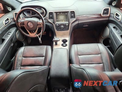 Zdjęcie 8 z 13 samochodu: 2014 JEEP GRAND CHEROKEE SUMMIT VIN:1C4RJFJM3EC426232 - miniatura