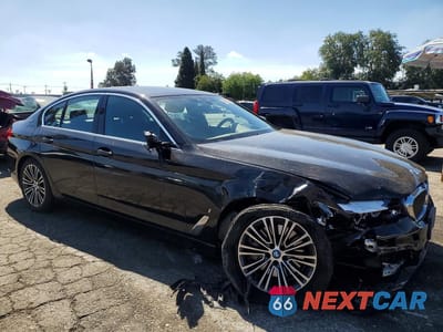 Czwarte zdjęcie samochodu z boku: 2019 BMW 530E VIN:WBAJA9C53KB392960 - miniatura