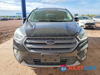 Piąte zdjęcie samochodu w środku: 2017 FORD ESCAPE TITANIUM VIN:1FMCU9JD9HUD63548 - miniatura