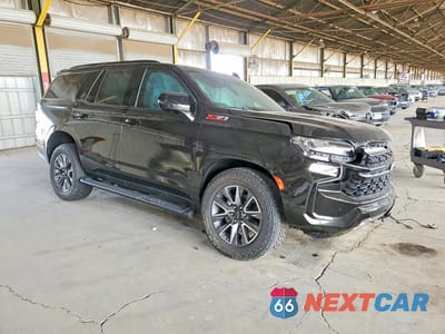 Czwarte zdjęcie samochodu z boku: 2024 CHEVROLET TAHOE K1500 Z71 VIN:1GNSKPKD3RR205839 - miniatura