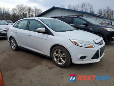 Czwarte zdjęcie samochodu z boku: 2013 FORD FOCUS SE VIN:1FADP3F25DL235947 - miniatura