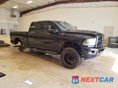 Czwarte zdjęcie samochodu z boku: 2014 RAM 2500 SLT VIN:3C6UR5DLXEG181630 - miniatura