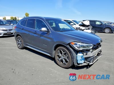 Czwarte zdjęcie samochodu z boku: 2016 BMW X1 XDRIVE28I VIN:WBXHT3C35G5E55057 - miniatura