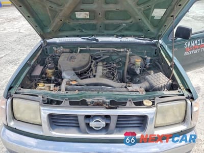 Zdjęcie 11 z 12 samochodu: 2000 NISSAN FRONTIER XE VIN:1N6DD26S7YC334396 - miniatura