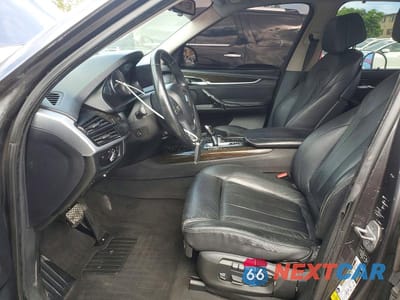 Zdjęcie 7 z 12 samochodu: 2014 BMW X5 SDRIVE35I VIN:5UXKR2C5XE0H31965 - miniatura