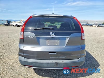 Zdjęcie 6 z 13 samochodu: 2012 HONDA CR-V EXL VIN:JHLRM3H75CC012794 - miniatura