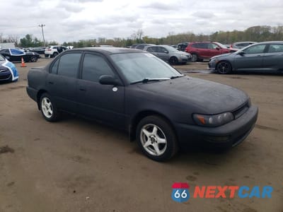 Czwarte zdjęcie samochodu z boku: 1994 TOYOTA COROLLA BASE VIN:2T1AE04B2RC063959 - miniatura