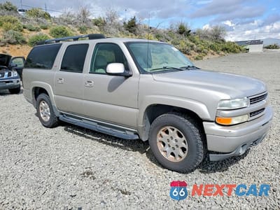 Czwarte zdjęcie samochodu z boku: 2005 CHEVROLET SUBURBAN C1500 VIN:3GNEC16ZX5G173611 - miniatura