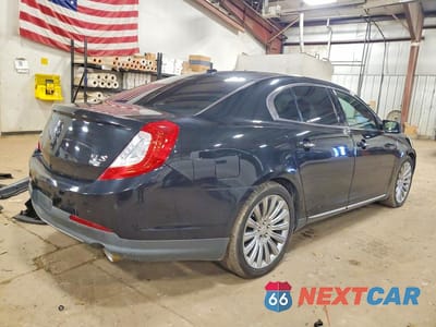 Trzecie zdjęcie samochodu z tyłu: 2014 LINCOLN MKS VIN:1LNHL9EKXEG604514 - miniatura